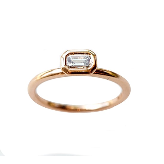 Bezel Set Emerald Cut Diamond in Rose Gold Bezel Set Emerald Cut Diamond in Rose Gold