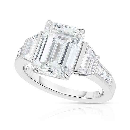 Three Stone Emerald Cut Diamond Engagement Ring With Trapezoid side stones and channel set Princess Cut Diamonds